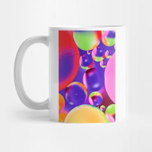 Colorful close up of oil drops in water Mug